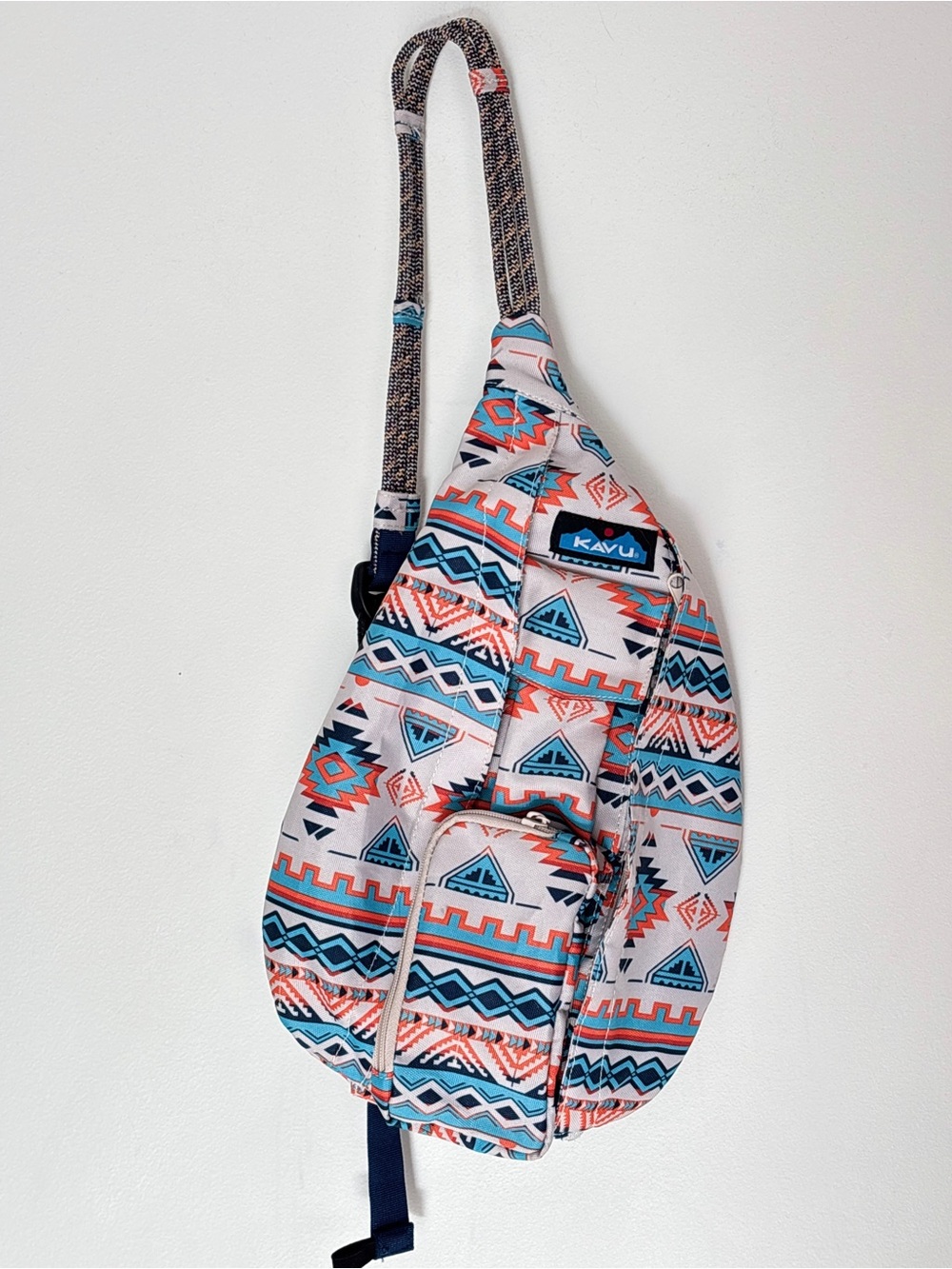 Kavu Aztec Pattern Sling Bag in White, Teal, Coral and Navy